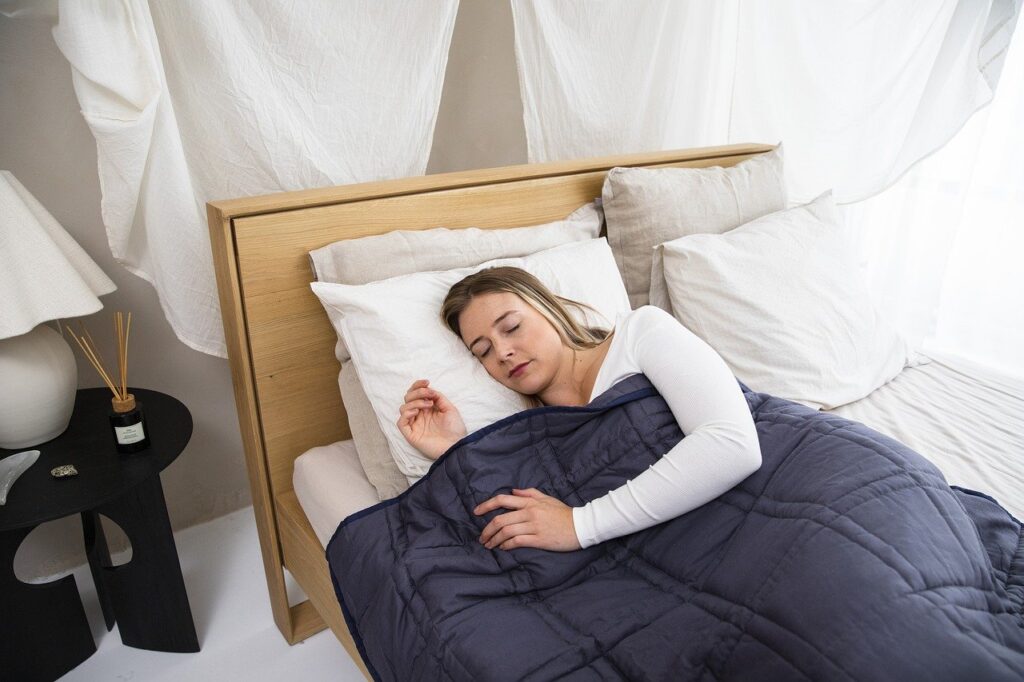 Sleeping with a weighted blanket